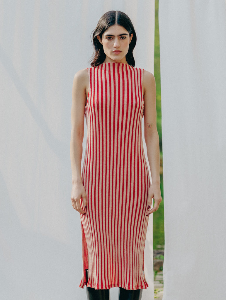 Swiss-made unique rib-knit cotton dress with pleated design, elegant high neckline, and chic side slits, perfect for evening wear or casual style, sustainable and made to order