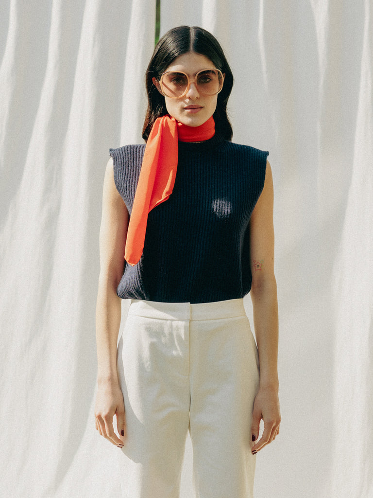 ASTRA: Flared legs, hook closure, handmade fringes. Sustainable, versatile, stylish. GOTS certified.