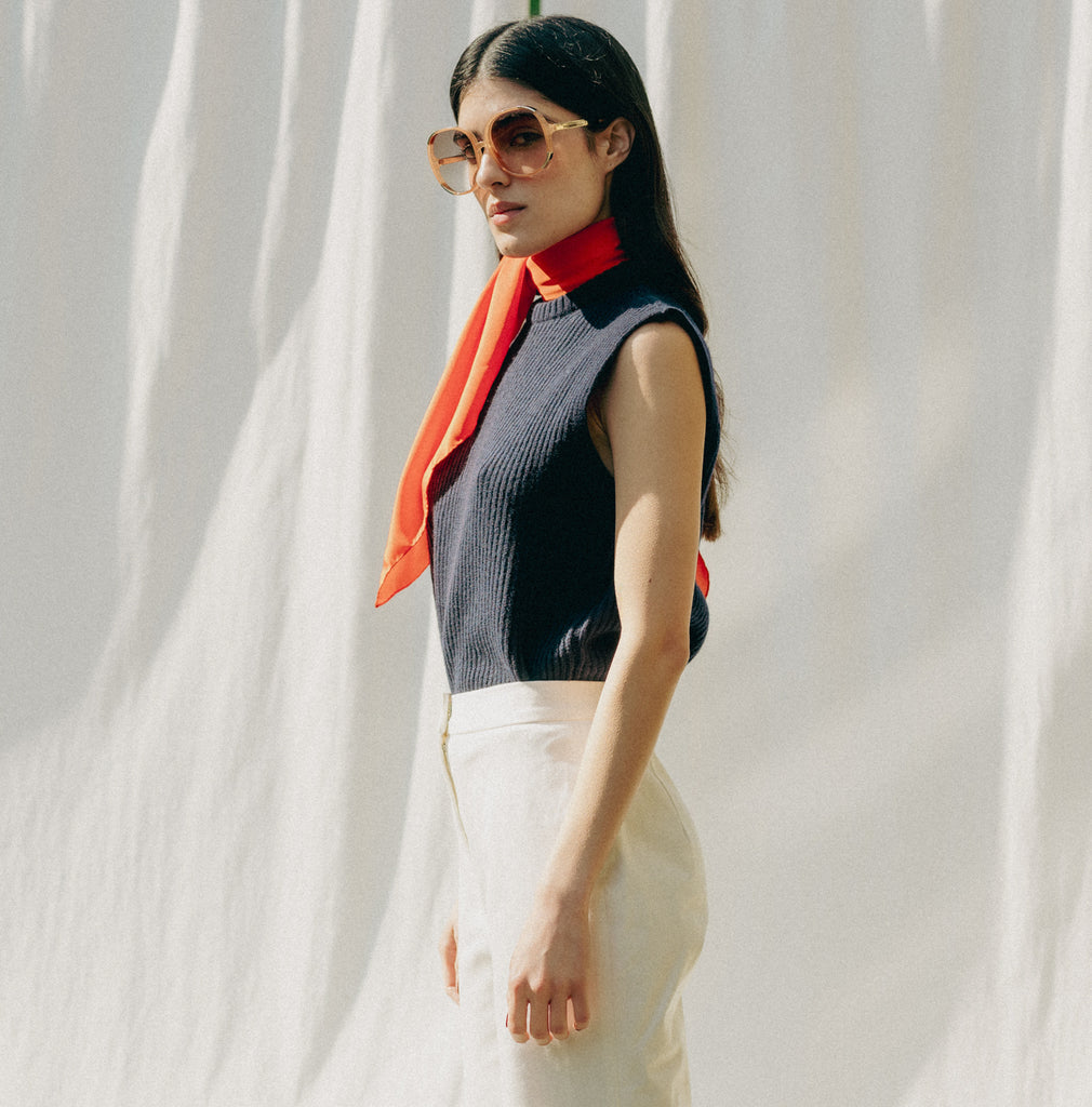 Indulge in luxury with our Navy Statement Piece, 100% recycled cashmere from Italy. Snug, fitted collar for timeless elegance