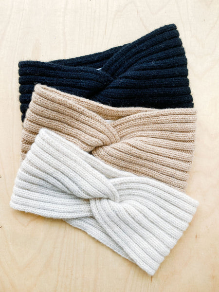 Eco-friendly headband in recycled cashmere, knitted in Italy, available in Black, Camel, Creme.