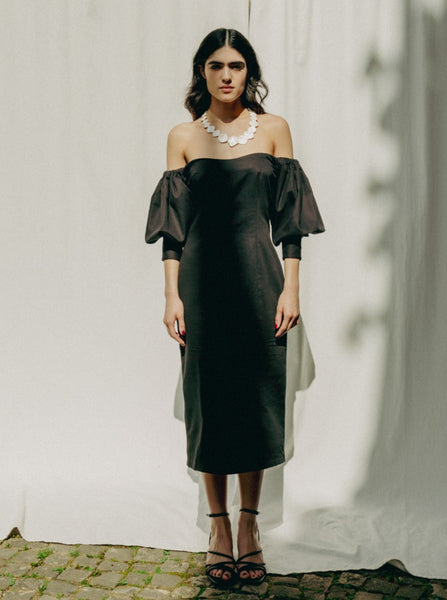 Sanaa dress: puff sleeves, feminine neckline, organic cotton satin, GOTS certified, available in black and white.