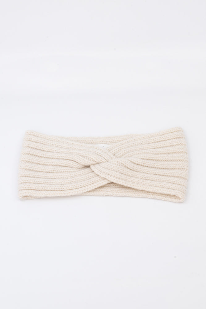 Eco-friendly headband in recycled cashmere, knitted in Italy, available in Black, Camel, Creme.